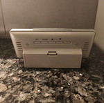 Digital table clock used with thermometer and alarm