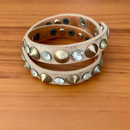 Bracelet with studs and transparent stones like new, beige and silver