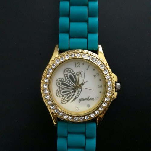 Women's round wristwatch with rhinestones used