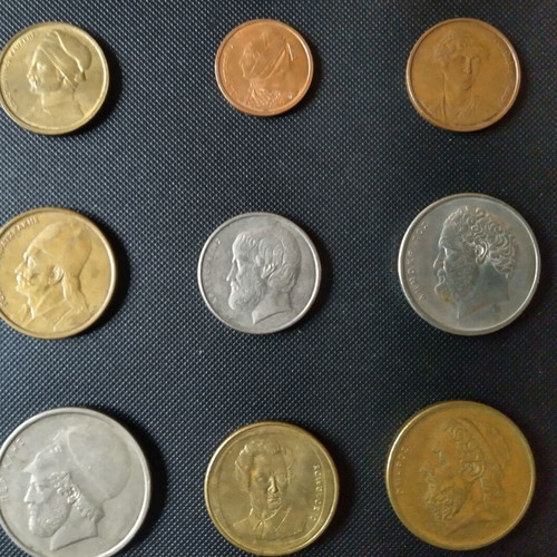 Set of nine used drachma coins