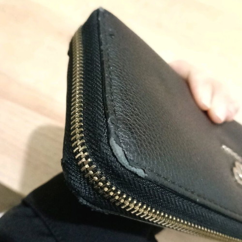 Guess wallet used, black