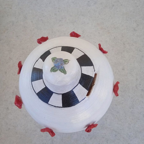 Handmade piggy bank with painted and embossed flowers, clay, new