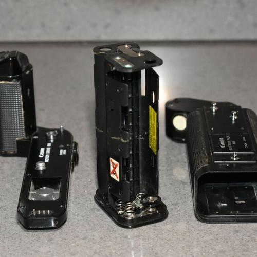 Canon A-1 collectible pack like new with Motor Drive, strap and 35mm f/2.8, 135mm lenses