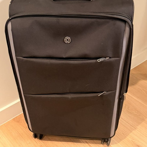 Large wheeled travel suitcase like new, black