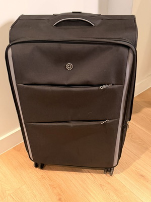 Large wheeled travel suitcase like new, black