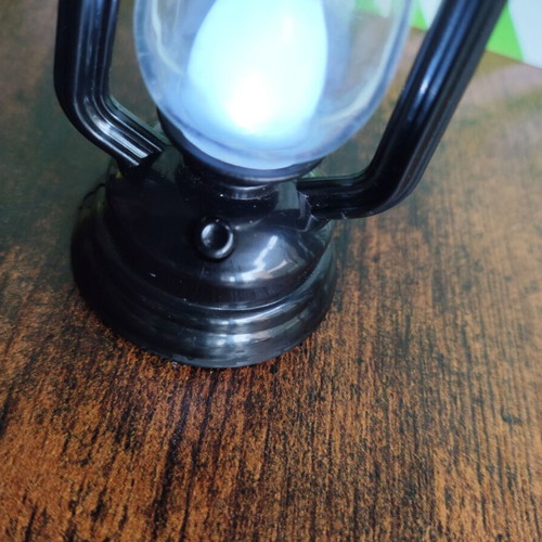 Miniature lantern like new with battery and switch