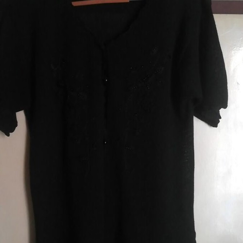 Summer blouse with intricate decoration