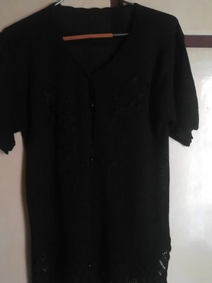 Summer blouse with intricate decoration