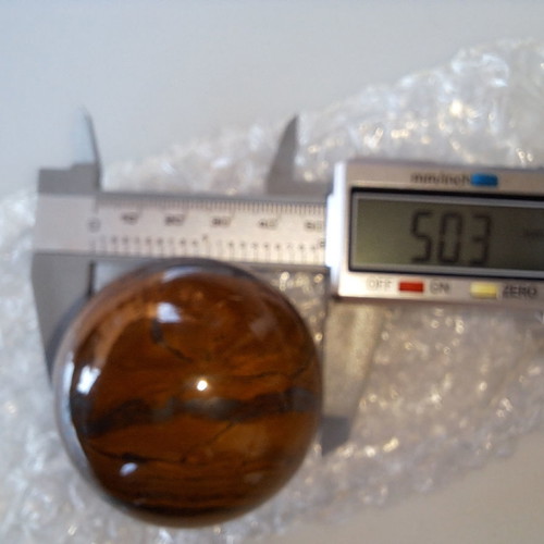 Tiger's Eye new, diameter 50.3 mm, weight 201.73 g