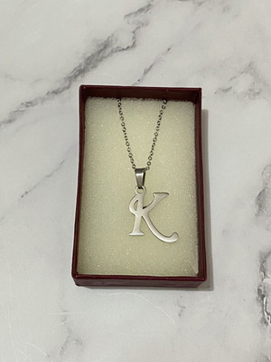 Monogram Necklace like new, silver color