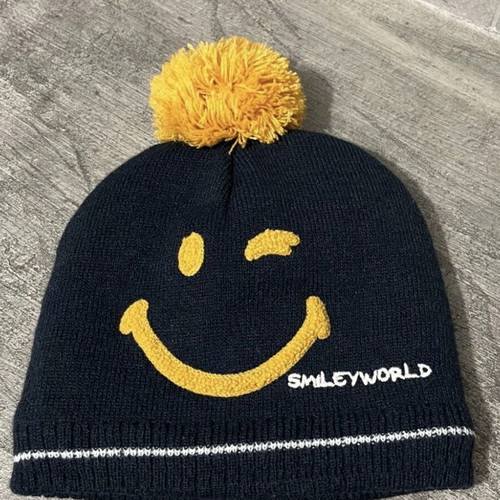 Smiley knitted hat used with sherpa lining