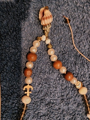 Necklace and bracelet like new, handmade with pearls and beads brown and gold