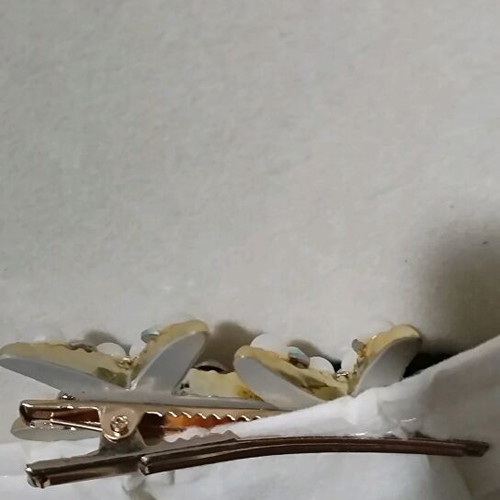 Hair clip like new, gold with pearls and stones