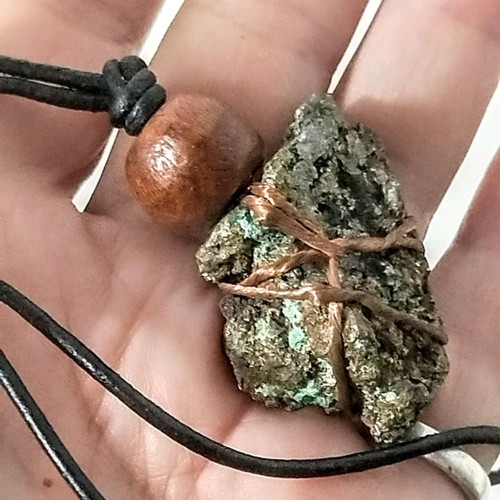 Pendant with pyrite new, gold copper wire and leather