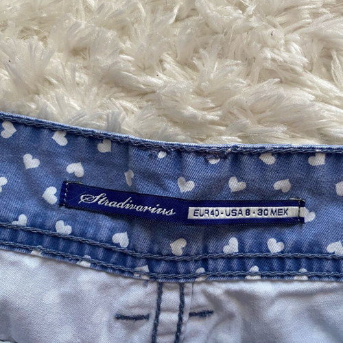 Stradivarius women's denim shorts used with white hearts, size M