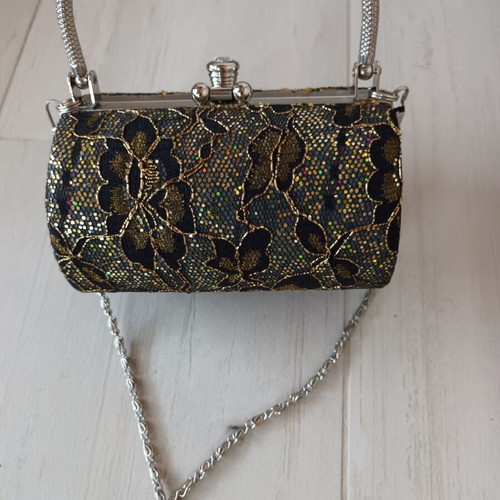 Evening bag like new, black and gold handheld