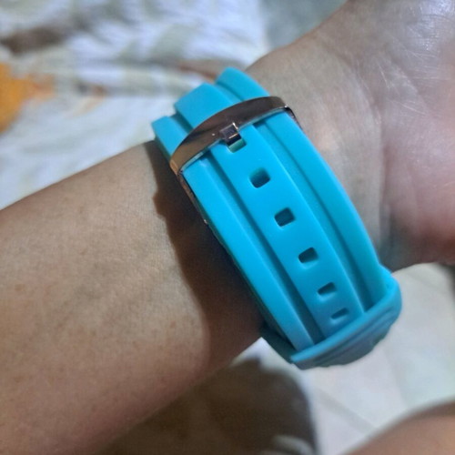 Women's watch used, rose gold with turquoise rubber strap