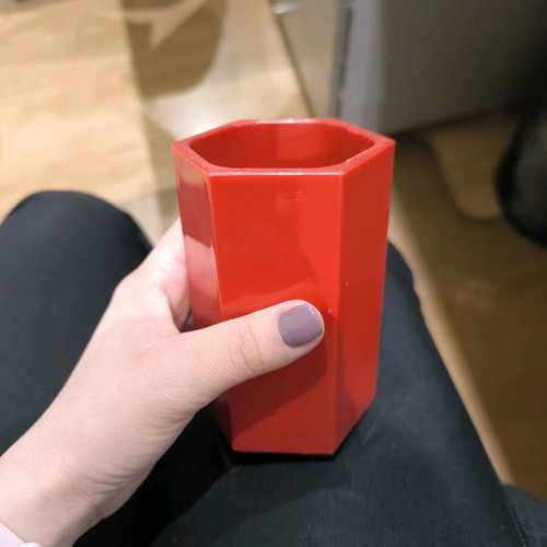 Red pencil holder used for office