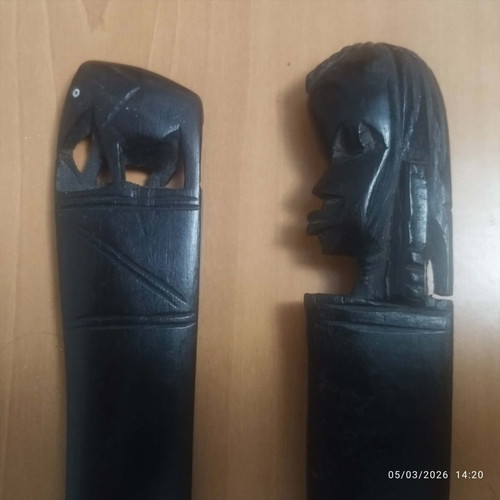 African wooden paper cutters used with elephant and female head design