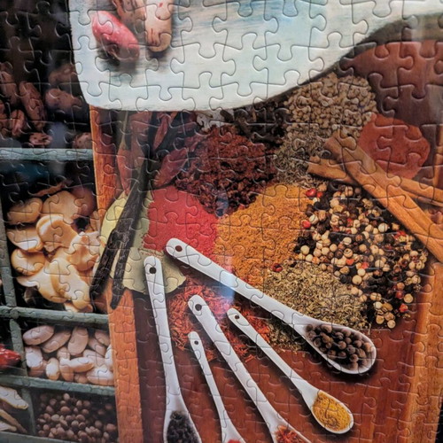 Puzzle frame with pasta and spices like new