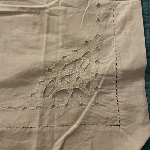 Pillowcase with cutwork embroidery used, button closure