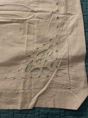 Pillowcase with cutwork embroidery used, button closure