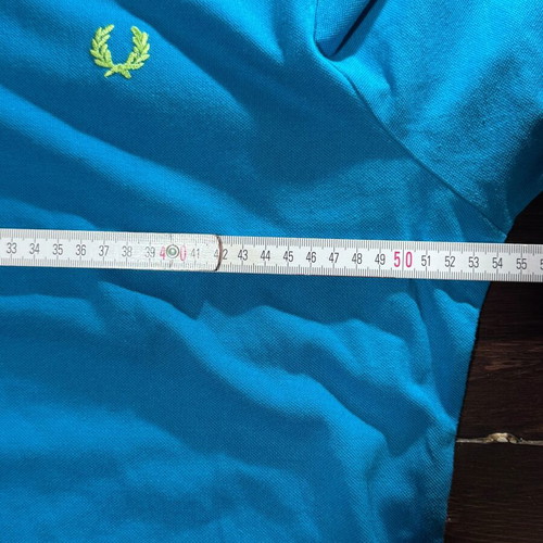 Fred Perry Polo shirt used, blue with neon green trim, size L