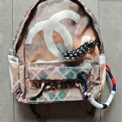 Chanel Graffiti backpack, size 40cm, beige canvas