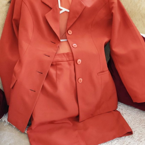 Orange suit and pants used, size 46