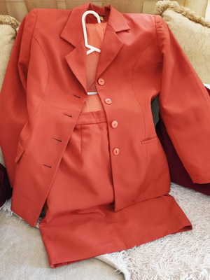 Orange suit and pants used, size 46