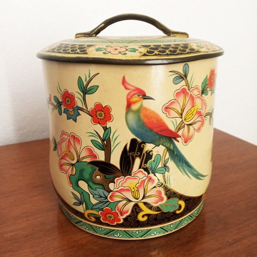 Vintage metal container used with lid and tropical bird decoration