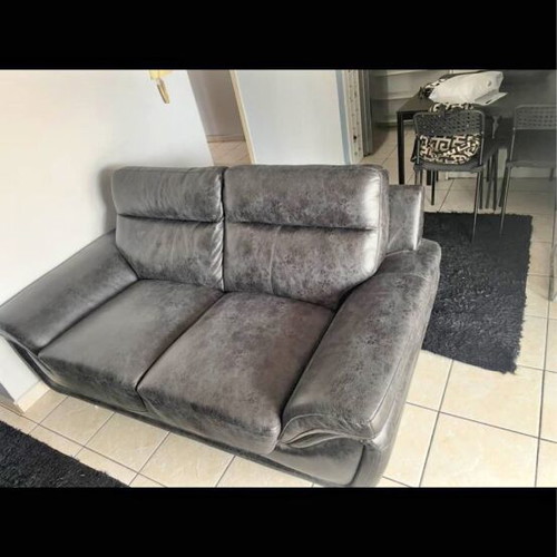 Two-seater sofa like new