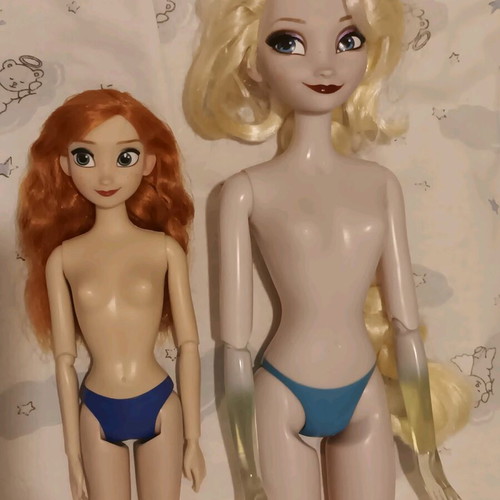 Disney Store Frozen dolls used, Anna and Elsa lot