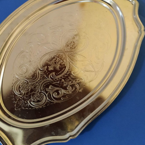 Silver-plated serving platter with embossed design, like new