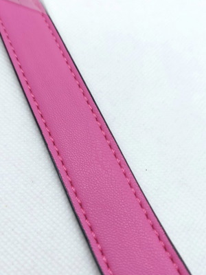 Adjustable bubblegum pink bag strap