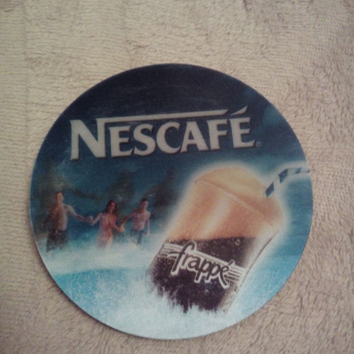 Collectible Nescafe promotional coaster new