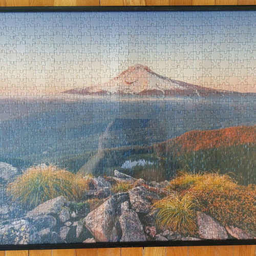 Framed puzzle like new, dimensions 0.53x0.73 m