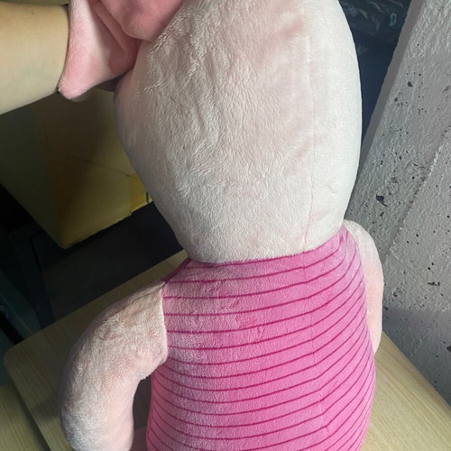 Large stuffed toy used with open seam and missing filling
