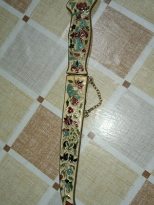 Brass paper cutter used with enamel and carved designs