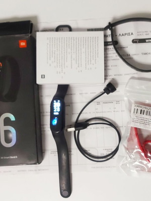 Xiaomi Mi Band 6 black fitness tracker with accessories