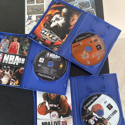 Bundle of used sports games for PlayStation 2 with manuals