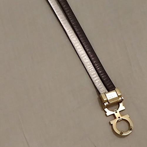 Salvatore Ferragamo double belt size 75 like new, black and gold
