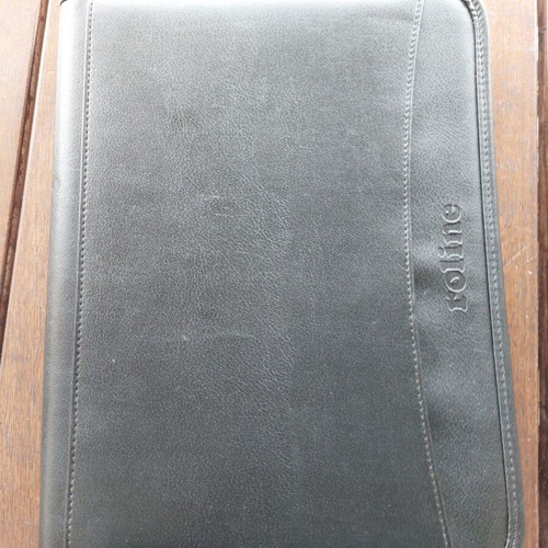 Leatherette folder like new with zipper and card slots