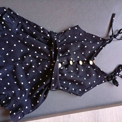 Black romper with white hearts 100cm like new