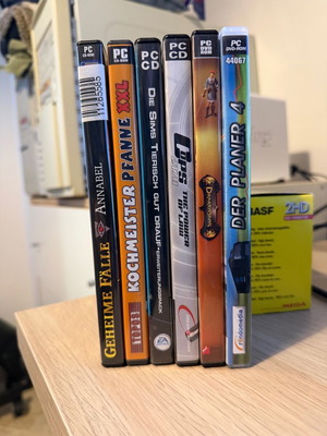 Pack of 6 casual PC CD/DVD games used in German