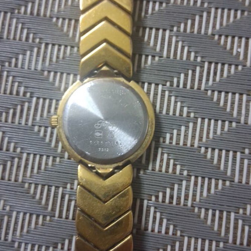 Longines wristwatch 1990 used, gold color, needs battery