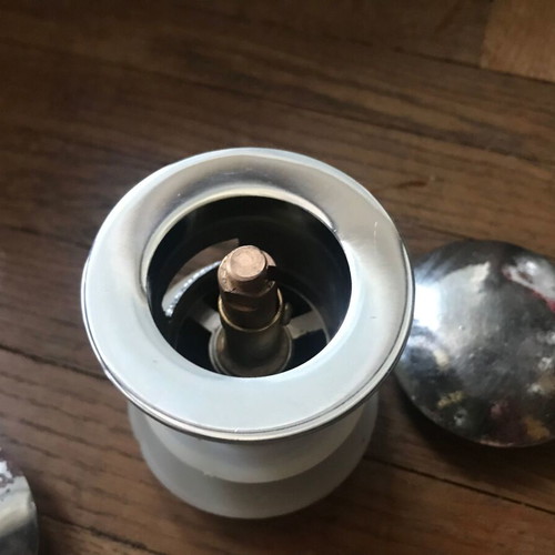 Brass mushroom sink valve used with two caps