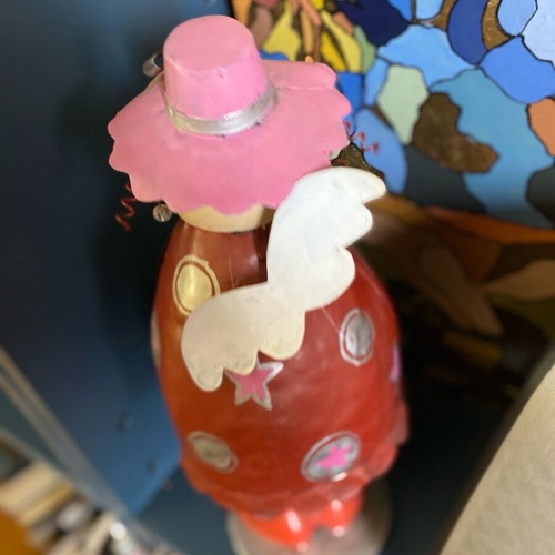 Decorative metal doll with spring like new