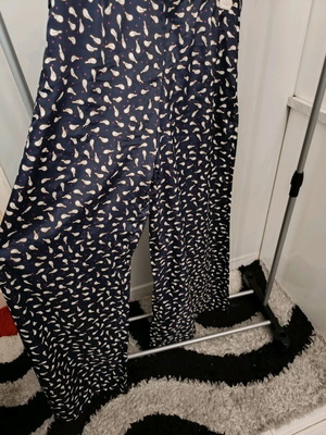 High-waisted pants with bird pattern like new, dark blue