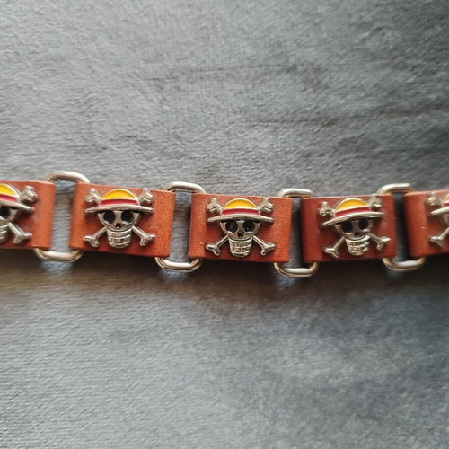 One Piece anime leather bracelet with Straw Hat skull logo used